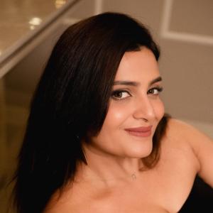 Divya Pillai Looks Elegant in a Black Strapless Jumpsuit