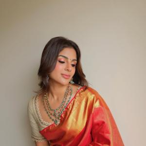 Samyukta Menon Stuns in Red and Gold Silk Saree