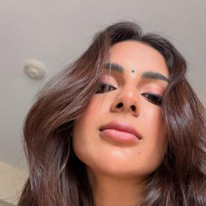 Samyukta Menon Stuns in Red and Gold Silk Saree