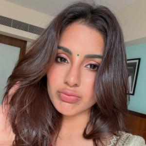 Samyukta Menon Stuns in Red and Gold Silk Saree