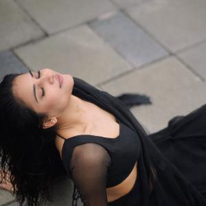 Prisha Singh Stuns in Elegant Black Saree by the Seaside