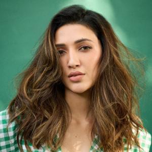 Actress Neha Shetty Stuns in Chic Green Gingham Outfit