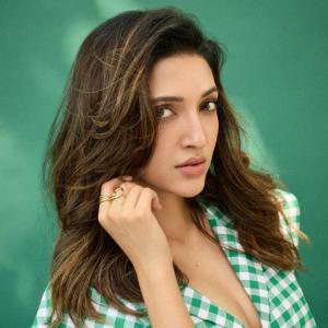 Actress Neha Shetty Stuns in Chic Green Gingham Outfit