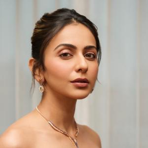 Rakul Preet Stuns in Red Strapless Gown With Elegant Styling