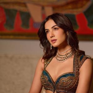 Sonal Chauhan Stuns in Lehenga With Emerald Jewellery
