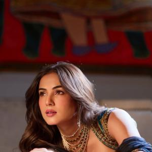 Sonal Chauhan Stuns in Lehenga With Emerald Jewellery