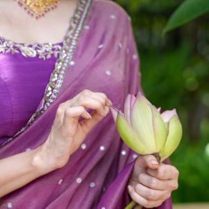 Manasa Varanasi Looks Graceful in Purple Traditional Attire