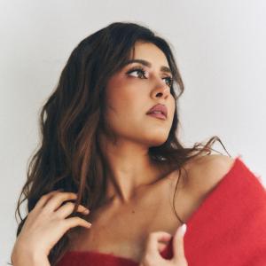 Actress Rashi Khanna Stuns in a Stylish Red Off-Shoulder Look