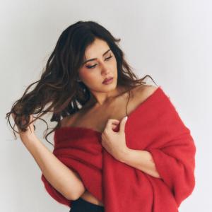 Actress Rashi Khanna Stuns in a Stylish Red Off-Shoulder Look