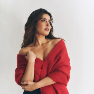 Actress Rashi Khanna Stuns in a Stylish Red Off-Shoulder Look