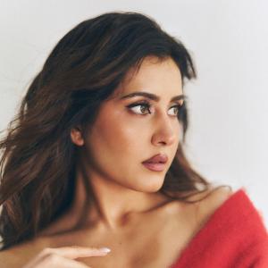 Actress Rashi Khanna Stuns in a Stylish Red Off-Shoulder Look