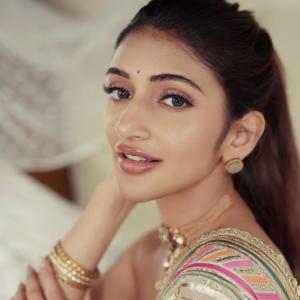 Sreeleela Shines in Elegant Cream and Gold Traditional Look