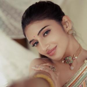 Sreeleela Shines in Elegant Cream and Gold Traditional Look