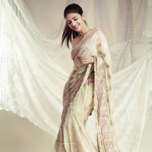 Sreeleela Shines in Elegant Cream and Gold Traditional Look