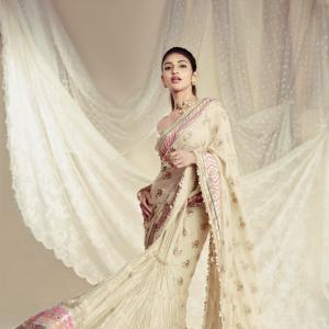 Sreeleela Shines in Elegant Cream and Gold Traditional Look