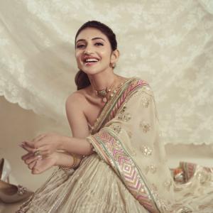 Sreeleela Shines in Elegant Cream and Gold Traditional Look