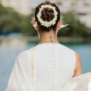 Nayanthara Looks Elegant in Ivory-White Saree With Gold Border