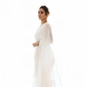 Nayanthara Looks Elegant in Ivory-White Saree With Gold Border
