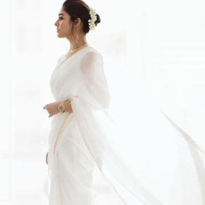 Nayanthara Looks Elegant in Ivory-White Saree With Gold Border