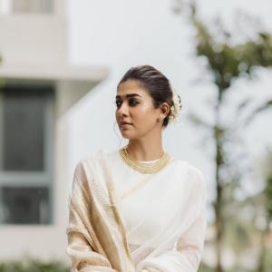 Nayanthara Looks Elegant in Ivory-White Saree With Gold Border