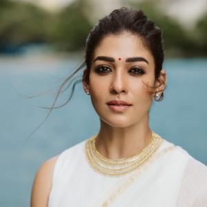 Nayanthara Looks Elegant in Ivory-White Saree With Gold Border