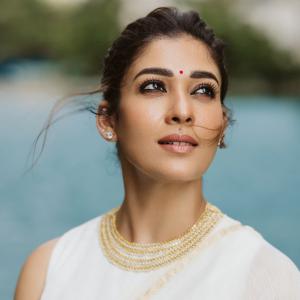 Nayanthara Looks Elegant in Ivory-White Saree With Gold Border