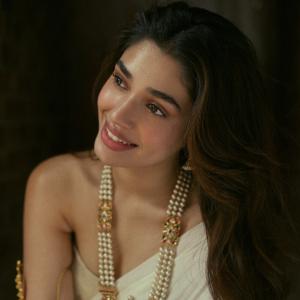 Kriti Shetty Stuns in Elegant Ivory Saree and Pearl Jewelry