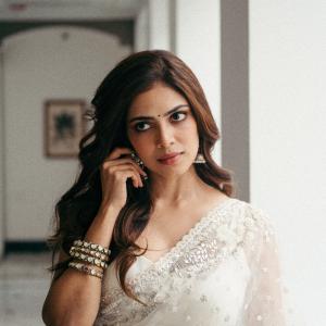 Actress Malavika Mohanan Looks Elegant in Ivory White Saree