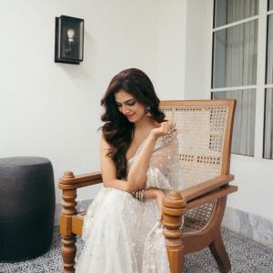 Actress Malavika Mohanan Looks Elegant in Ivory White Saree