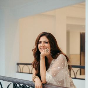 Actress Malavika Mohanan Looks Elegant in Ivory White Saree