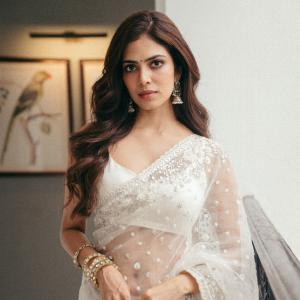 Actress Malavika Mohanan Looks Elegant in Ivory White Saree