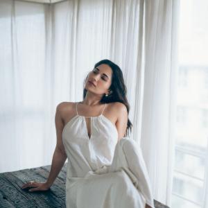 Actress Ruhani Sharma Looks Elegant in White Sleeveless Outfit