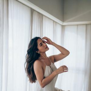 Actress Ruhani Sharma Looks Elegant in White Sleeveless Outfit