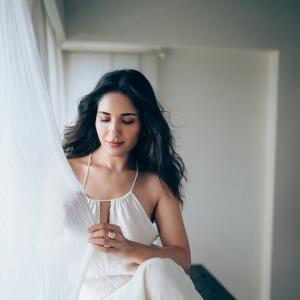 Actress Ruhani Sharma Looks Elegant in White Sleeveless Outfit