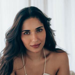 Actress Ruhani Sharma Looks Elegant in White Sleeveless Outfit