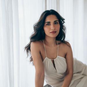 Actress Ruhani Sharma Looks Elegant in White Sleeveless Outfit