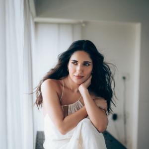Actress Ruhani Sharma Looks Elegant in White Sleeveless Outfit