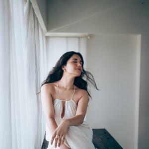 Actress Ruhani Sharma Looks Elegant in White Sleeveless Outfit