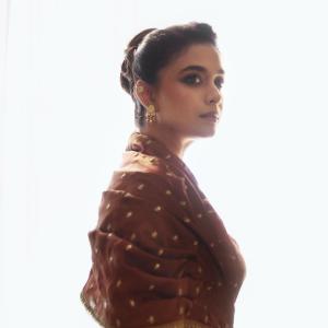 Keerthy Suresh Stuns in Wine-Maroon Silk Lehenga Look