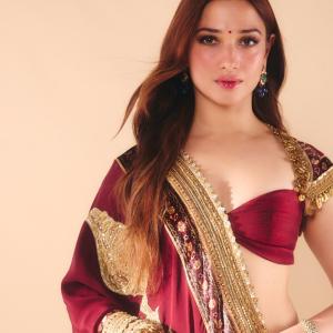 Tamanna Bhatia Stuns in Elegant Maroon and Gold Saree