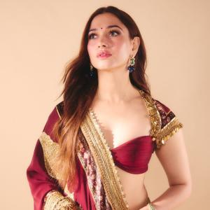 Tamanna Bhatia Stuns in Elegant Maroon and Gold Saree