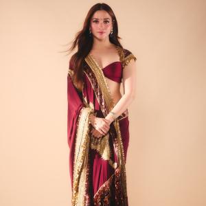 Tamanna Bhatia Stuns in Elegant Maroon and Gold Saree