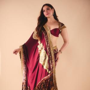 Tamanna Bhatia Stuns in Elegant Maroon and Gold Saree