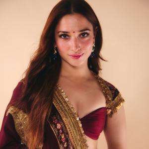 Tamanna Bhatia Stuns in Elegant Maroon and Gold Saree