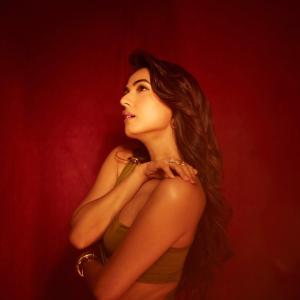 Sonal Chouhan Stuns in Elegant Olive-Gold Outfit