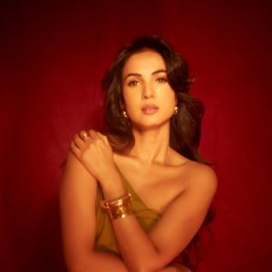 Sonal Chouhan Stuns in Elegant Olive-Gold Outfit