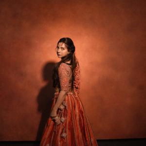 Madonna Sebastian Stuns in a Regal Red Traditional Look