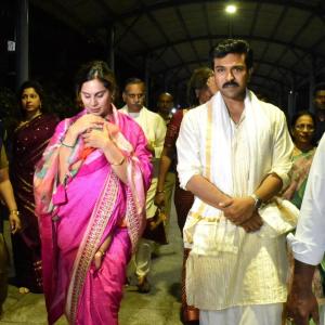 Ram charan and Upasana at tirumala Photos