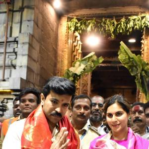 Ram charan and Upasana at tirumala Photos