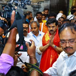 Ram charan and Upasana at tirumala Photos